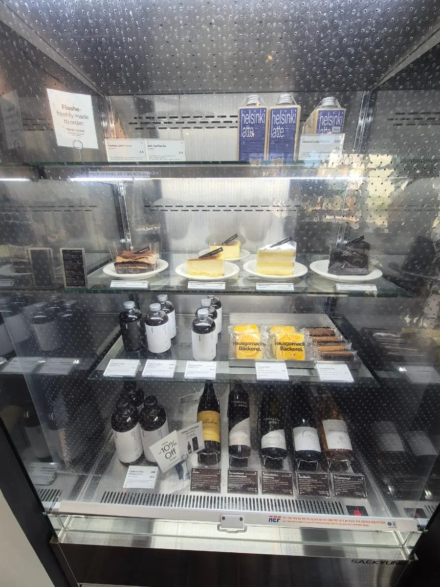 Refrigerator with bottled latte and cold brew
