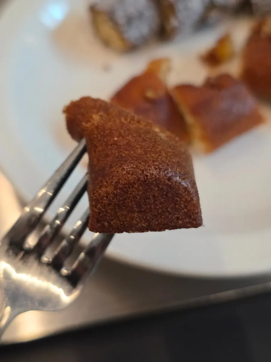 Two types of baton financier, caramel pecan and lamington