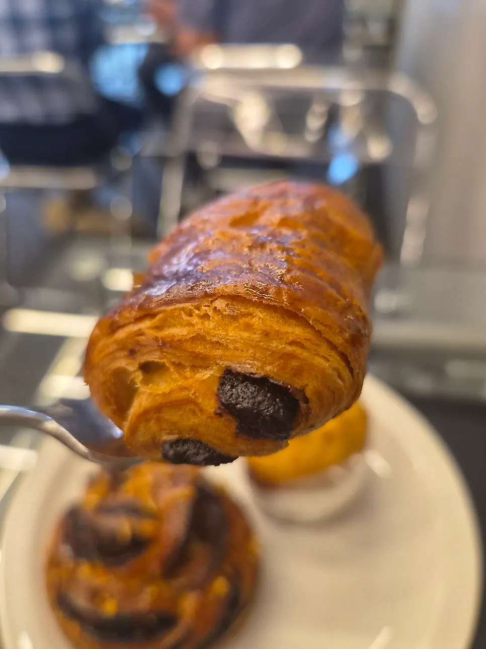 Petit pain au chocolat served with coffee