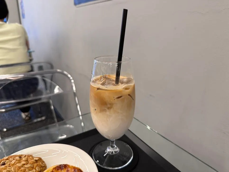 Helsinki latte with separated milk and coffee layers