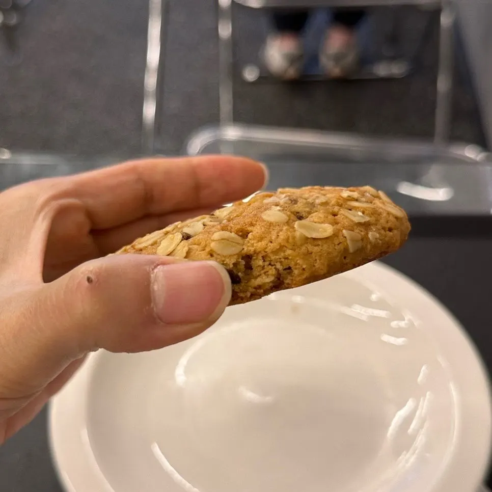 Side view of the thick oatmeal raisin cookie