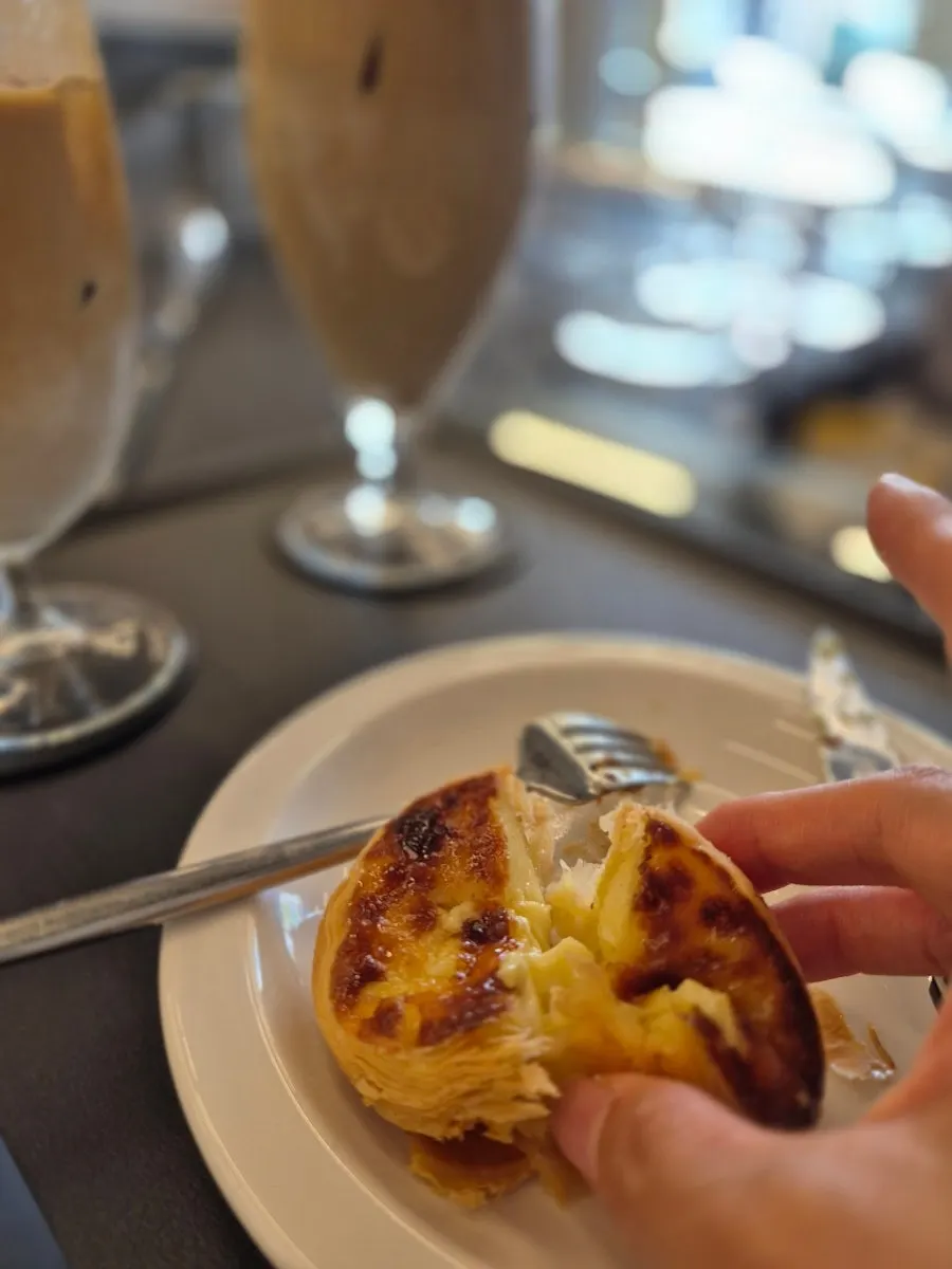 Egg tart, scones, and cookies in the display case