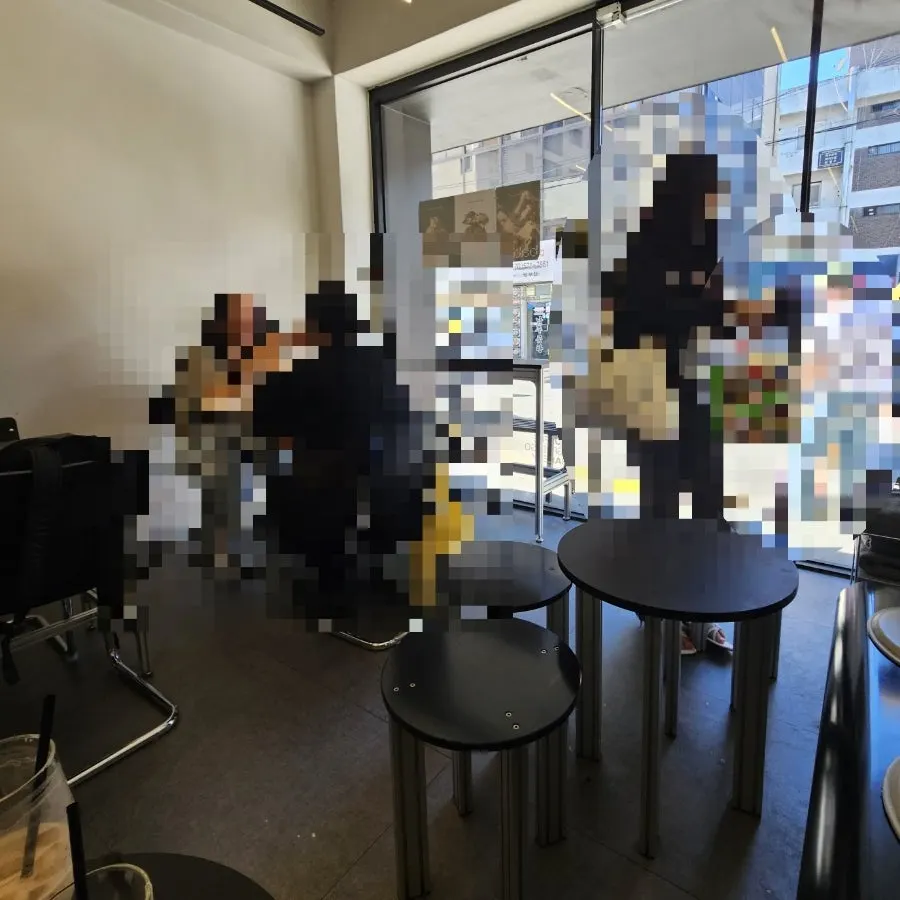 Café seating filled with weekend afternoon customers