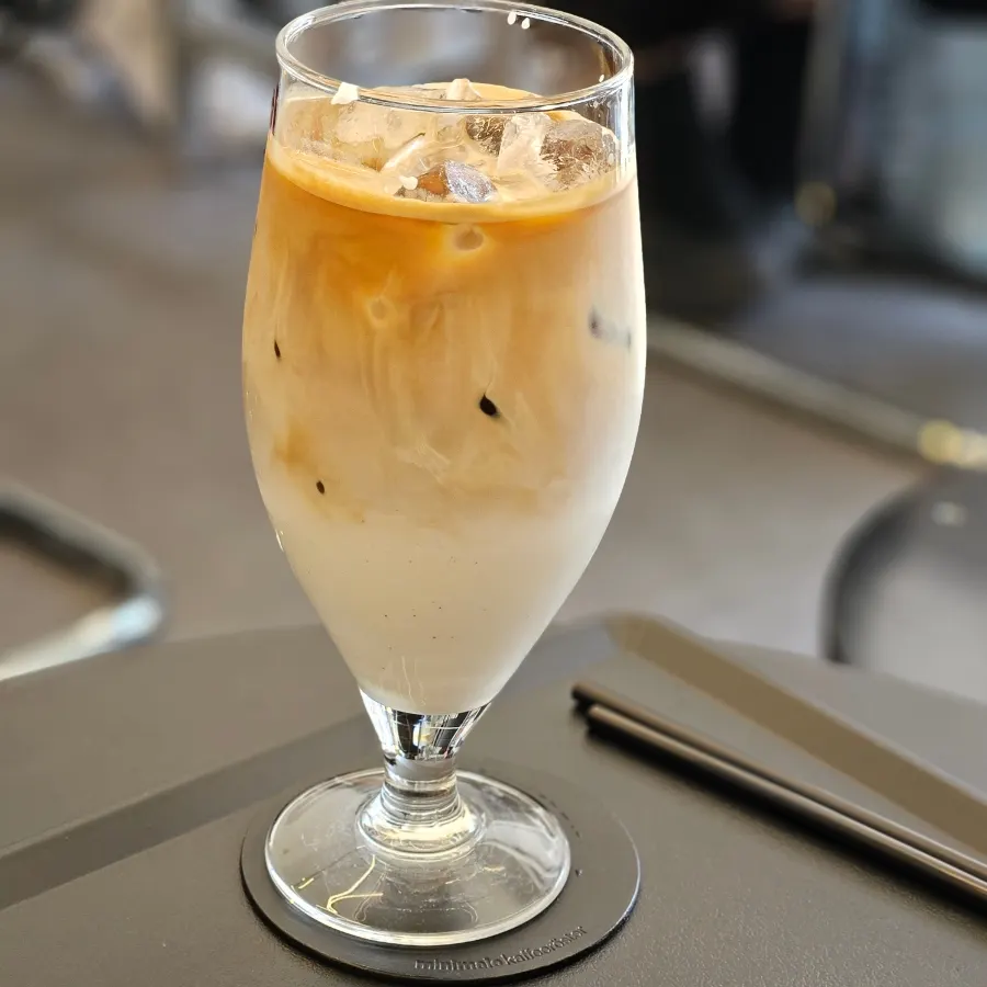 Venti-sized iced Helsinki latte