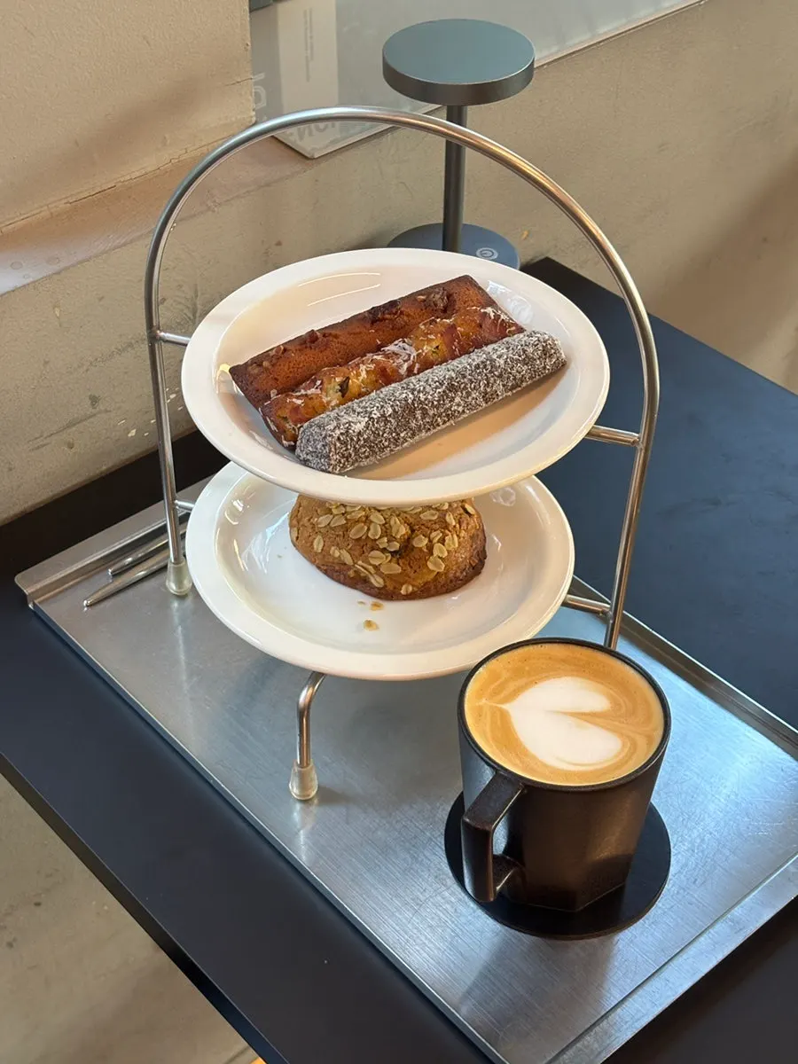 Oatmeal raisin New York cookie with a latte