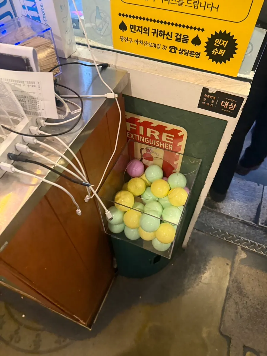 Interior space of Minji Superette with the 'Minji name' event signage