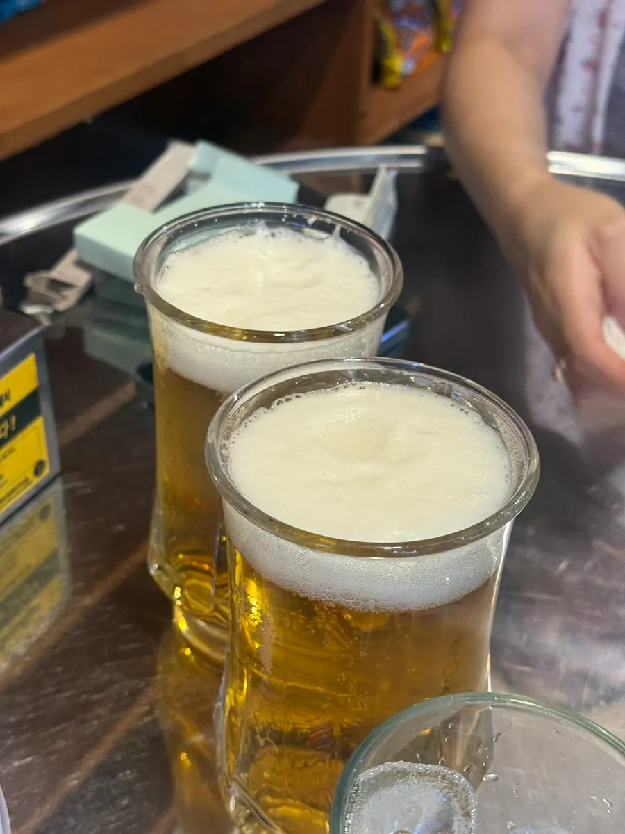 A glass of draft beer at Minji Superette