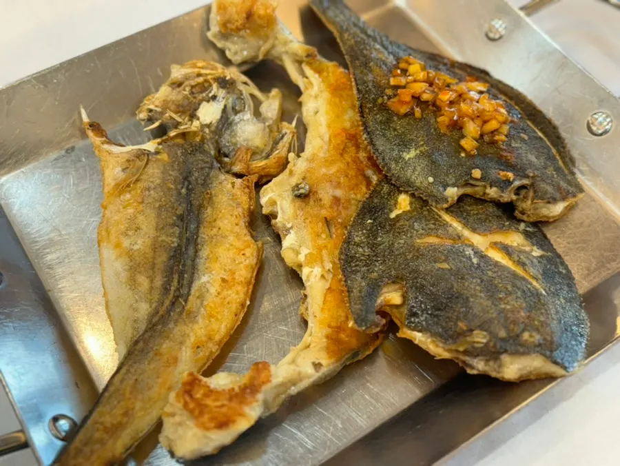 Grilled fish platter for two with cod cheek and flounder