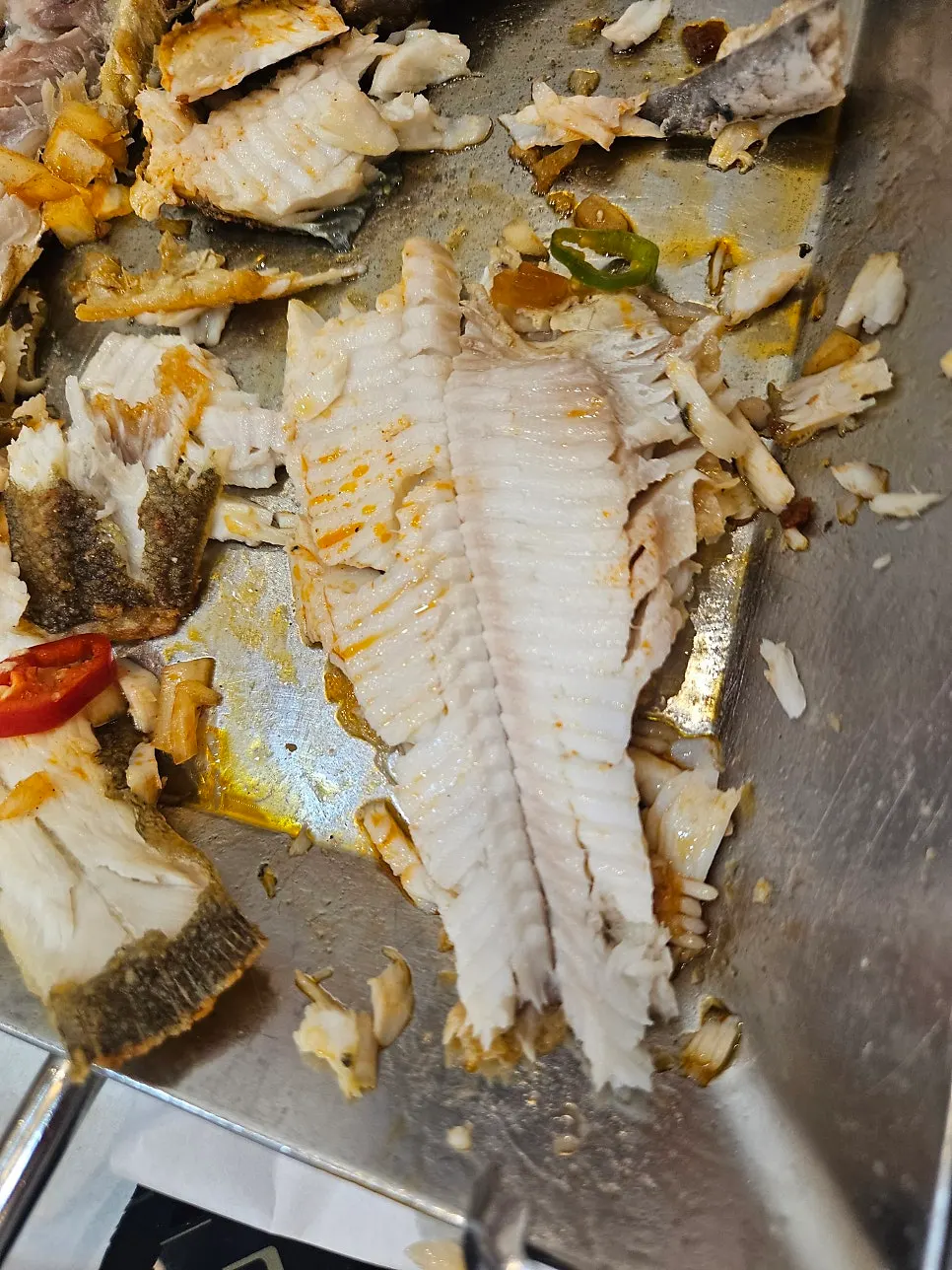 Generous portion of grilled fish on a plate