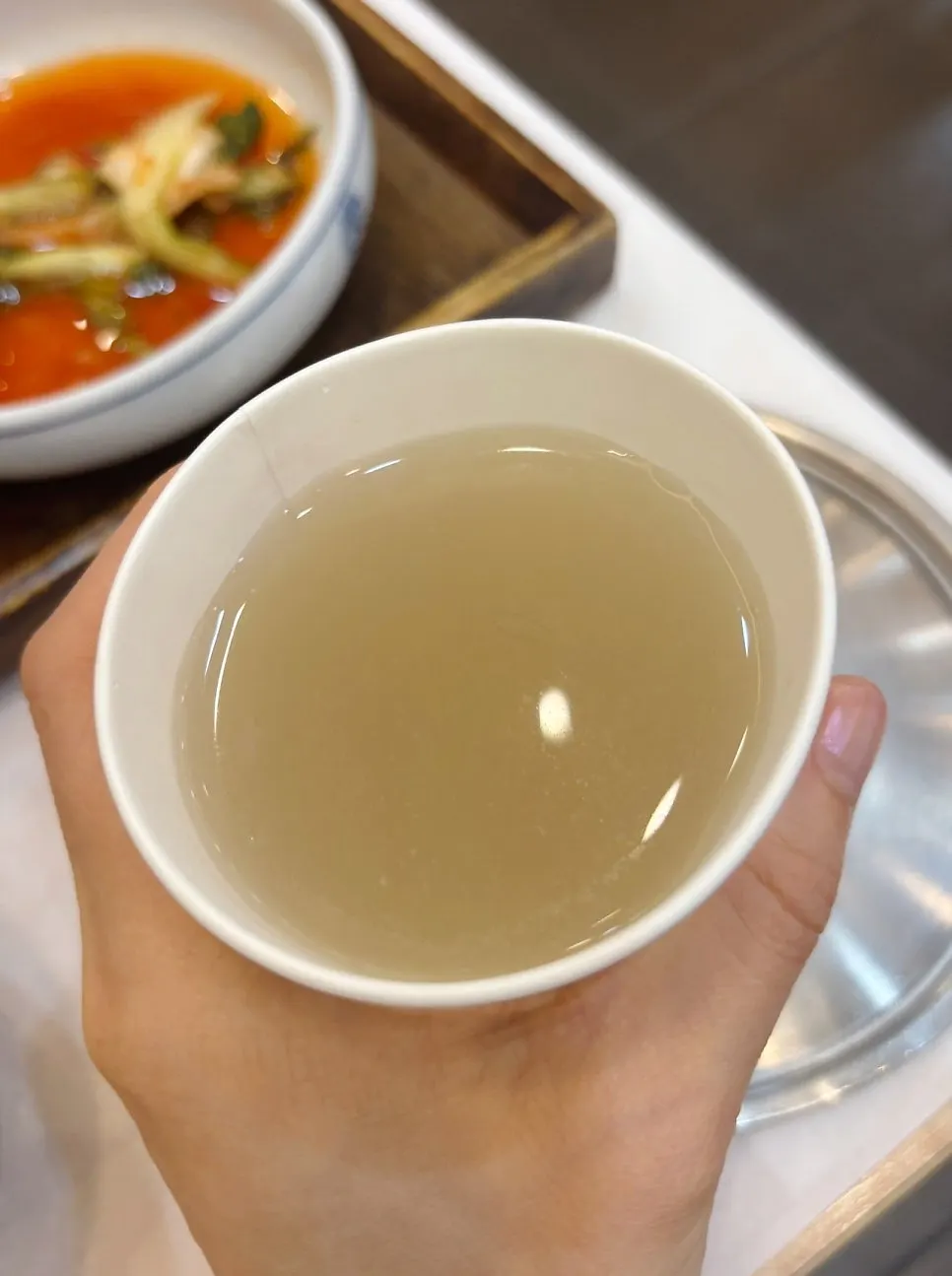 Homemade sikhye served at the end of the meal