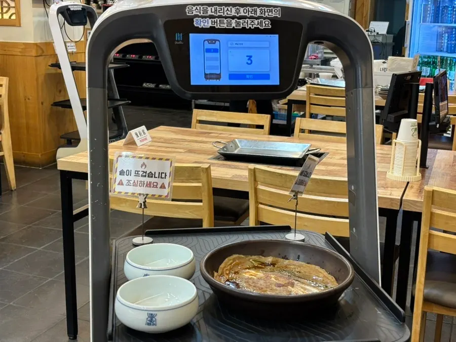 A bowl of doenjang soup scooped from the self-serve station