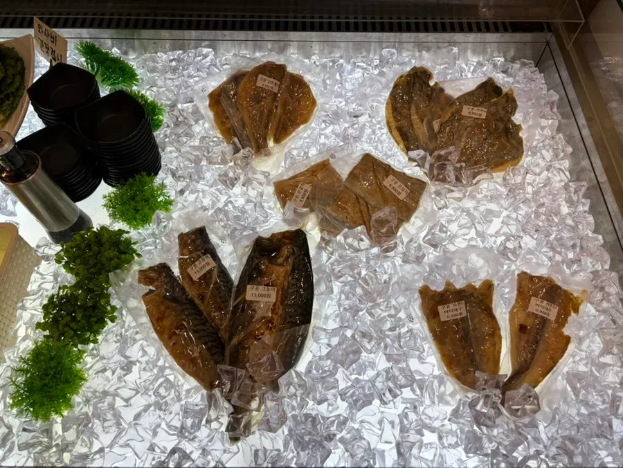 Shelf display of products sold at the restaurant