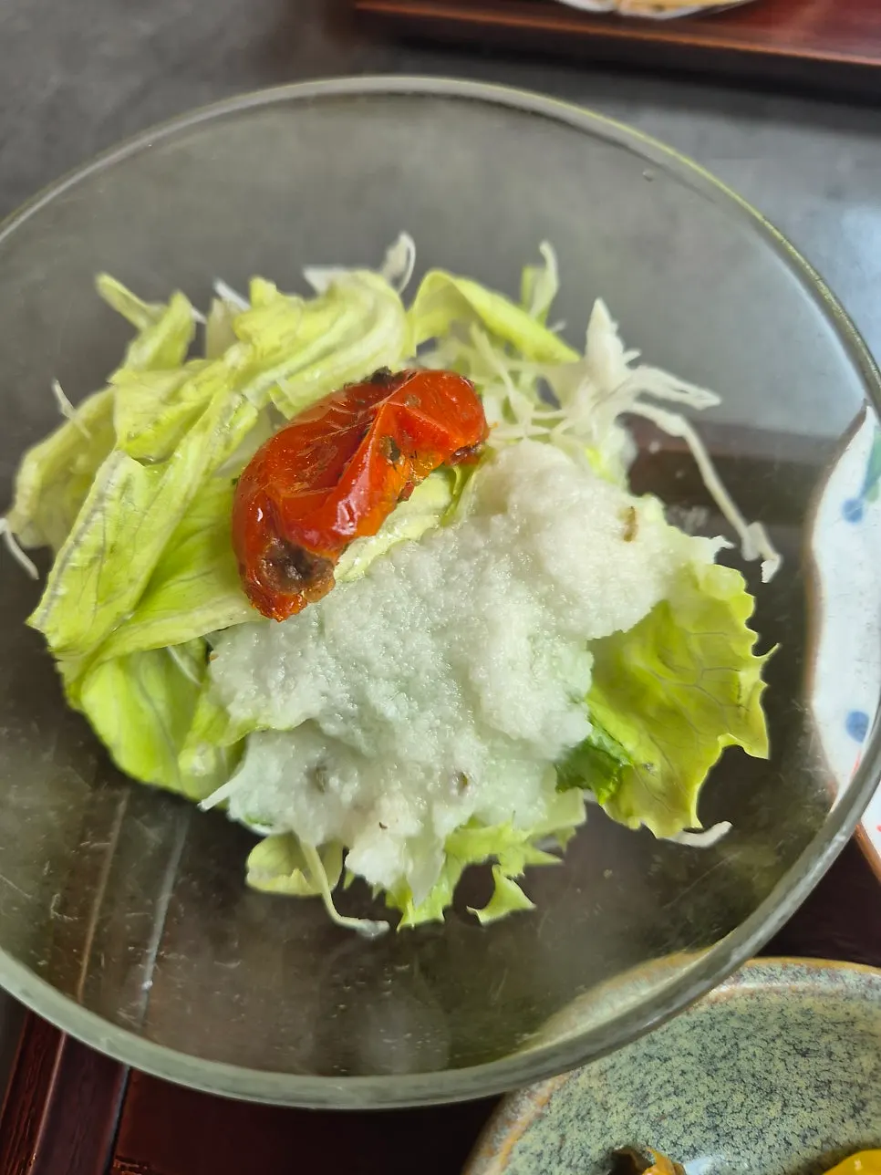 Crisp salad topped with fruit dressing