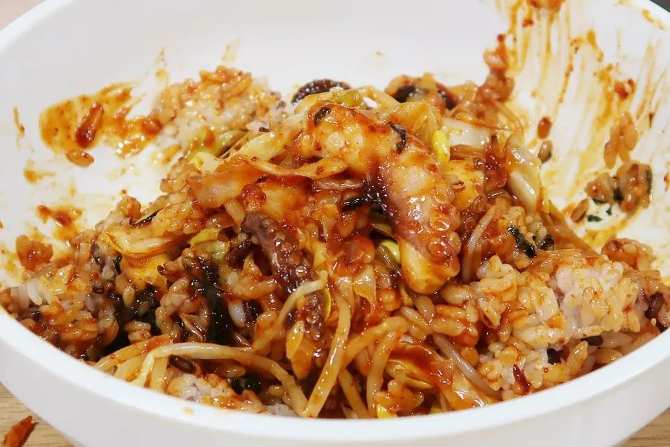 A spoonful of the mixed octopus bokkeum rice