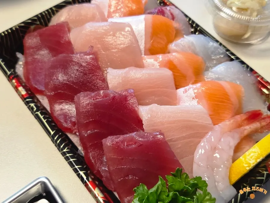 A piece of special mixed sushi with balanced rice ratio