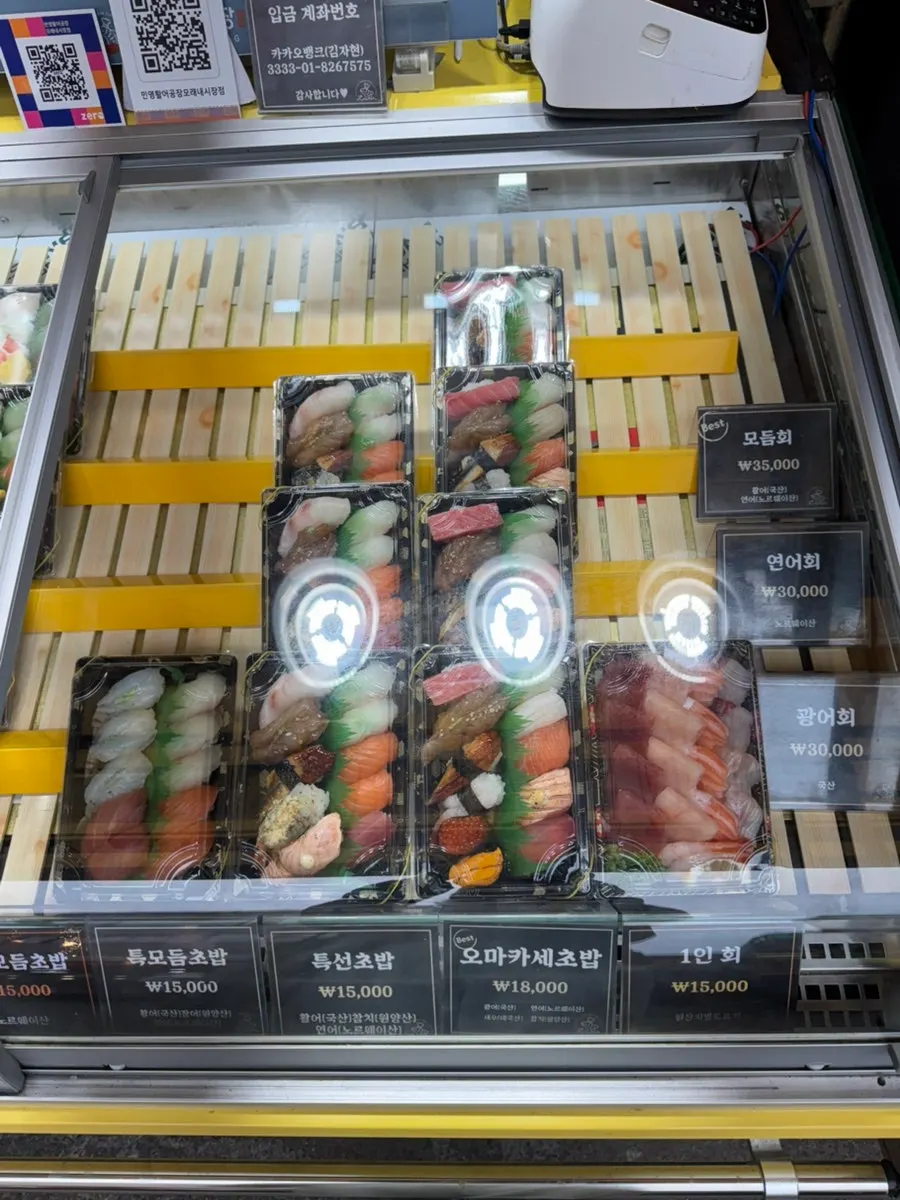 Sushi packed and displayed by type