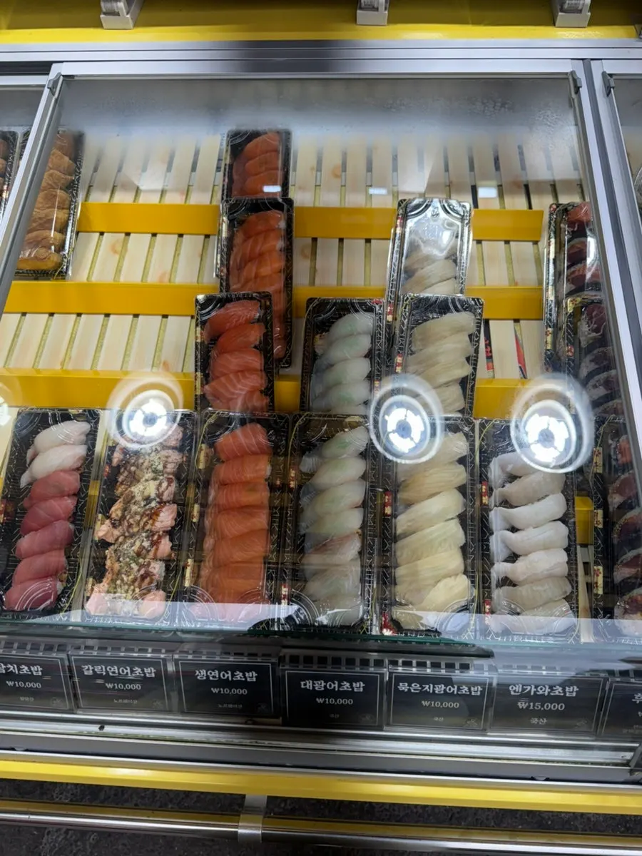 Takeout containers of sushi ready to grab and go