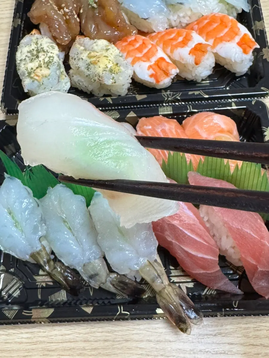 Close-up of shrimp topping on the mixed shrimp sushi