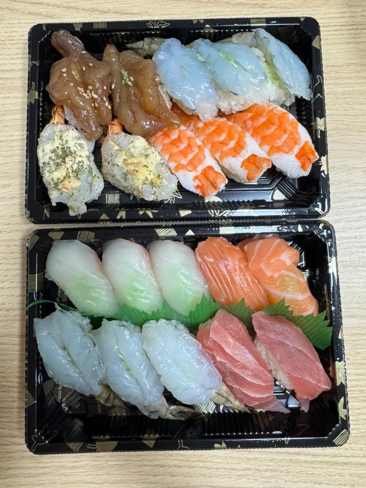 Special sushi and mixed shrimp sushi laid out together