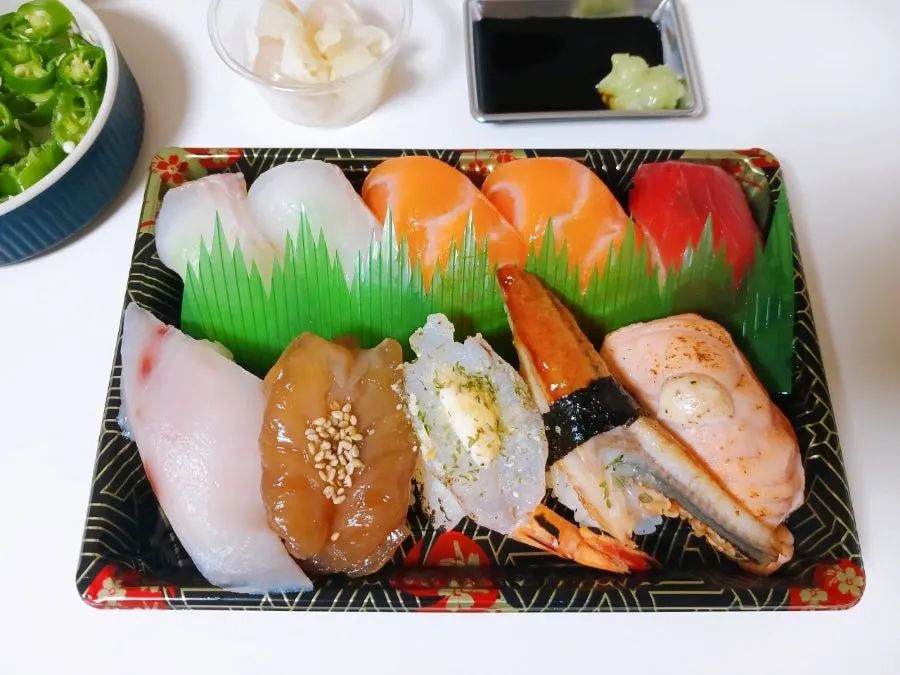 A plate of sushi served with cheongyang chili pepper