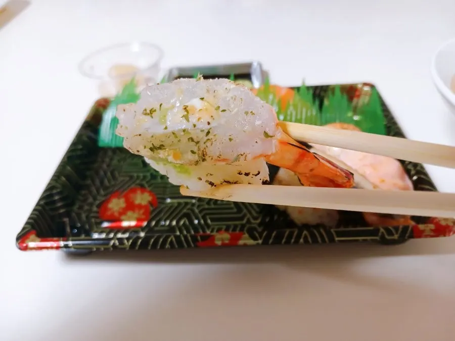 A piece of soy sauce shrimp sushi