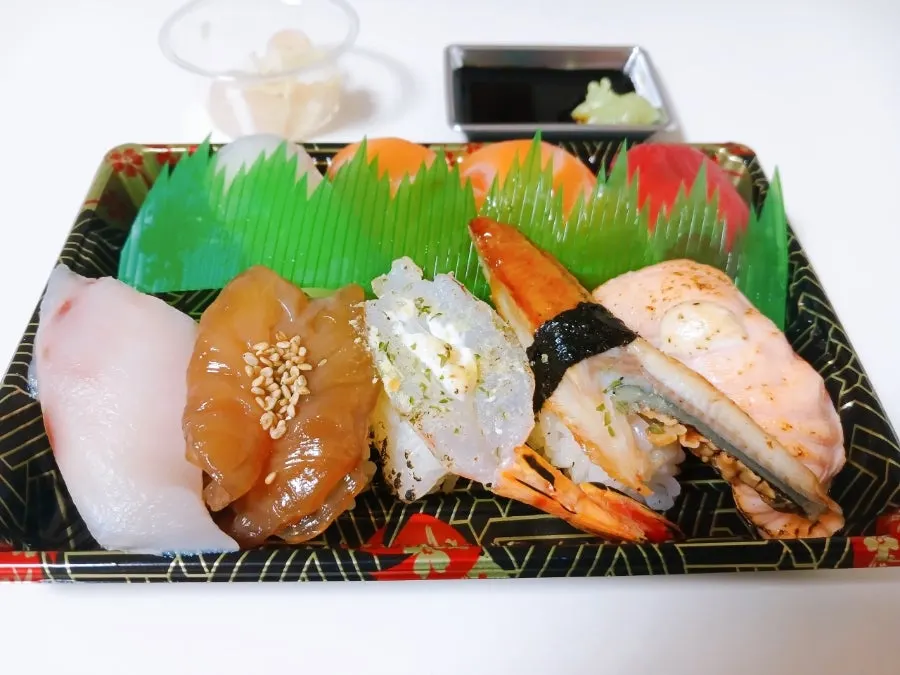 Empty sushi takeout box after finishing the meal