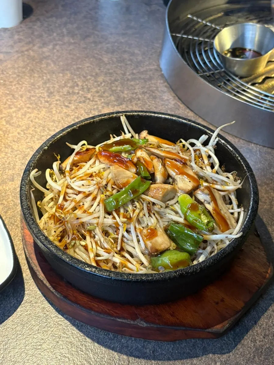 Complimentary hot stone sukju-muchim (bean sprout side dish)