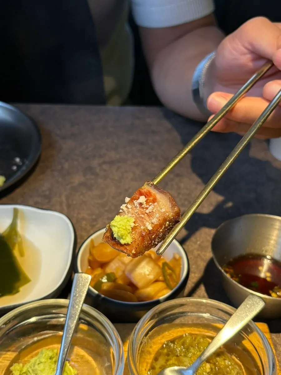 Meat paired with wasabi, salt, and pa-kimchi