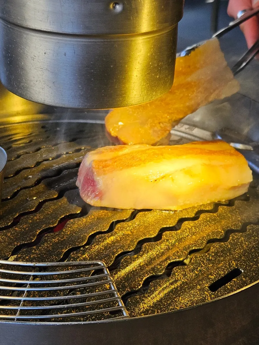 Close-up of grilled pork belly