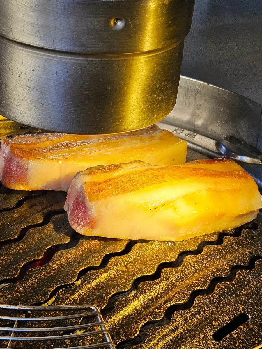 Pork belly dipped in salt