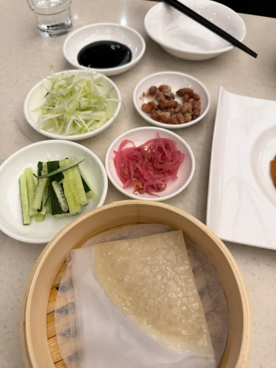 Scallion and cucumber strips served with the Peking duck