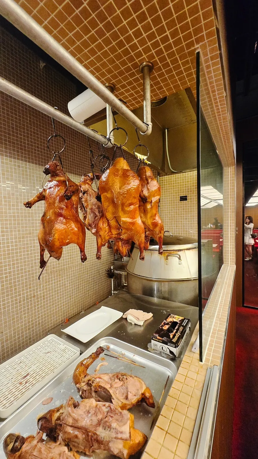 Peking duck being carved tableside