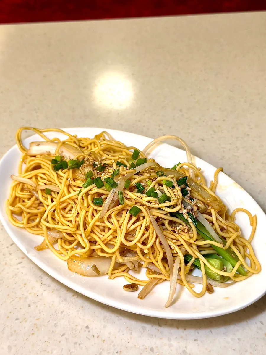 A plate of Hong Kong-style egg noodle stir-fry