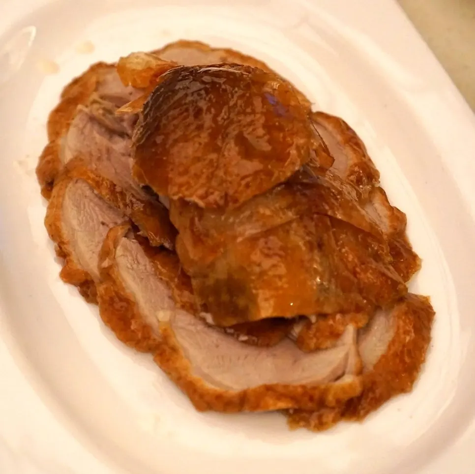 Plate of sliced Peking duck meat