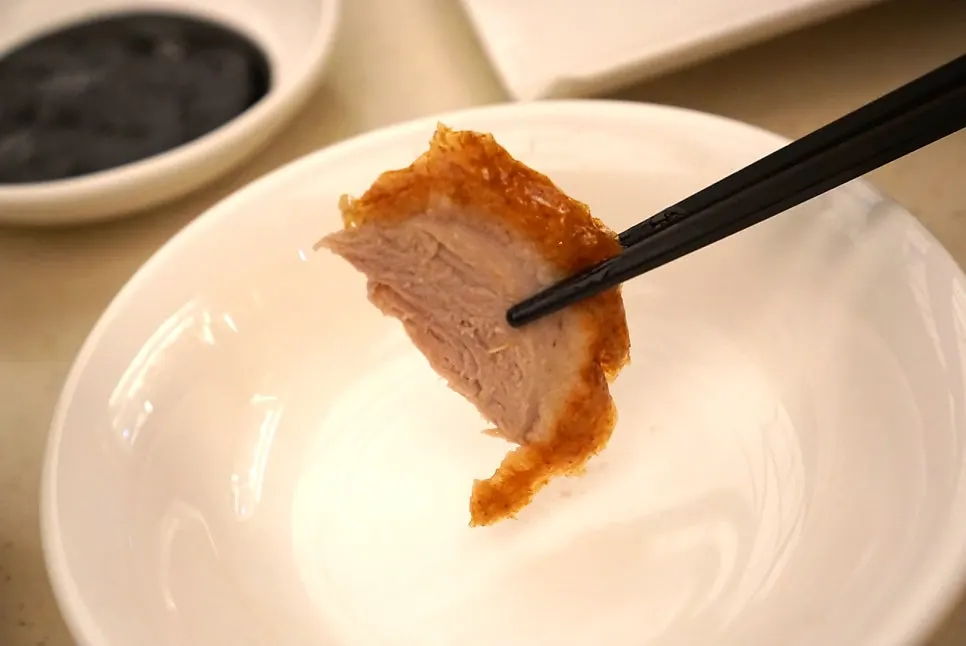 Crispy skin and moist meat of the Peking duck