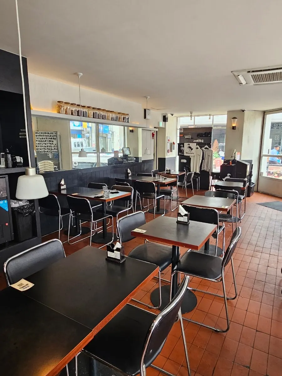 Dining hall with 2-person and 4-person tables