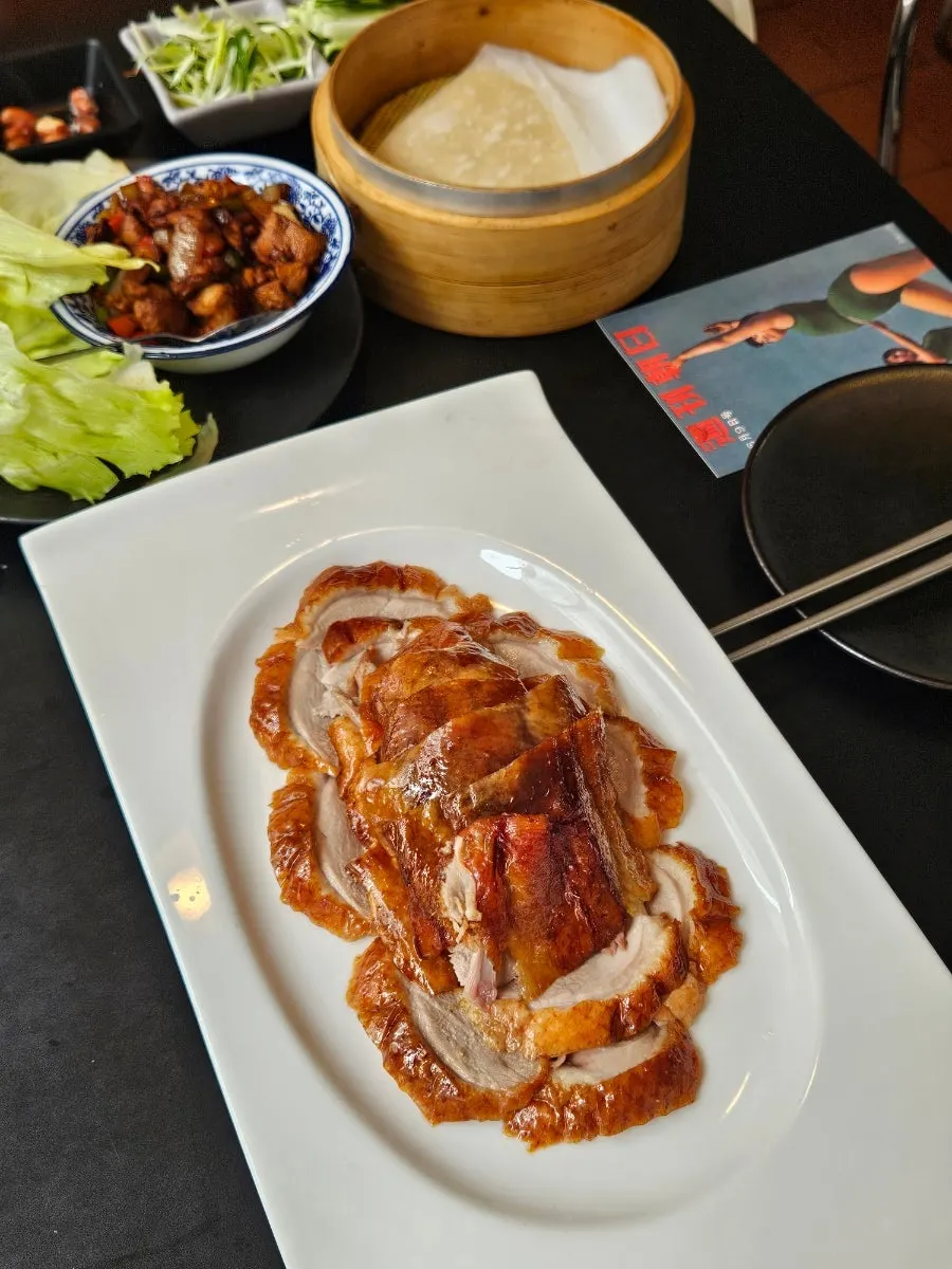 Neatly arranged slices of Peking duck