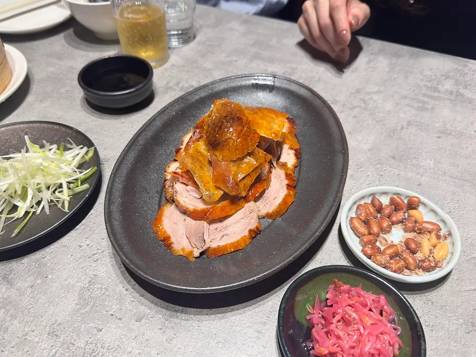 Table spread with Peking duck