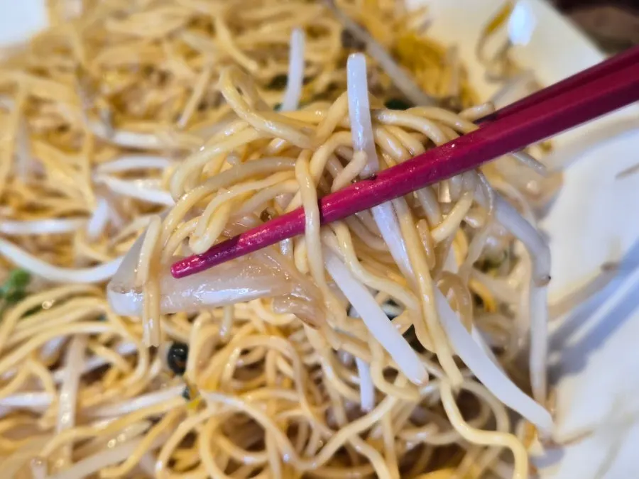 Table set with both Peking duck and egg noodles