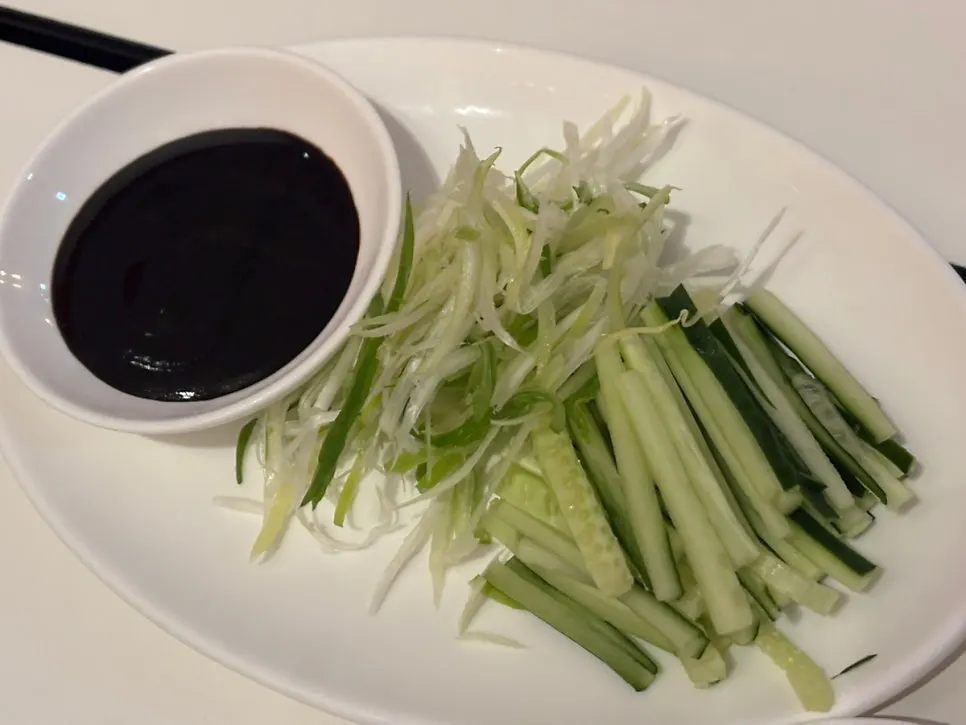 Julienned cucumber and scallion served with the Peking duck