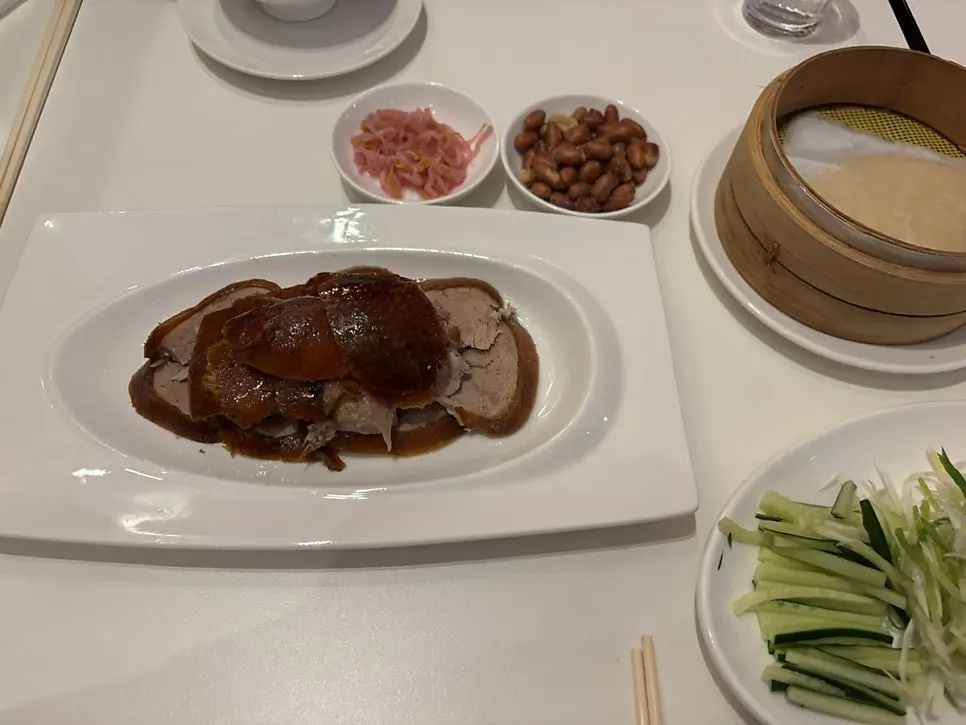 Half Peking duck served on a plate