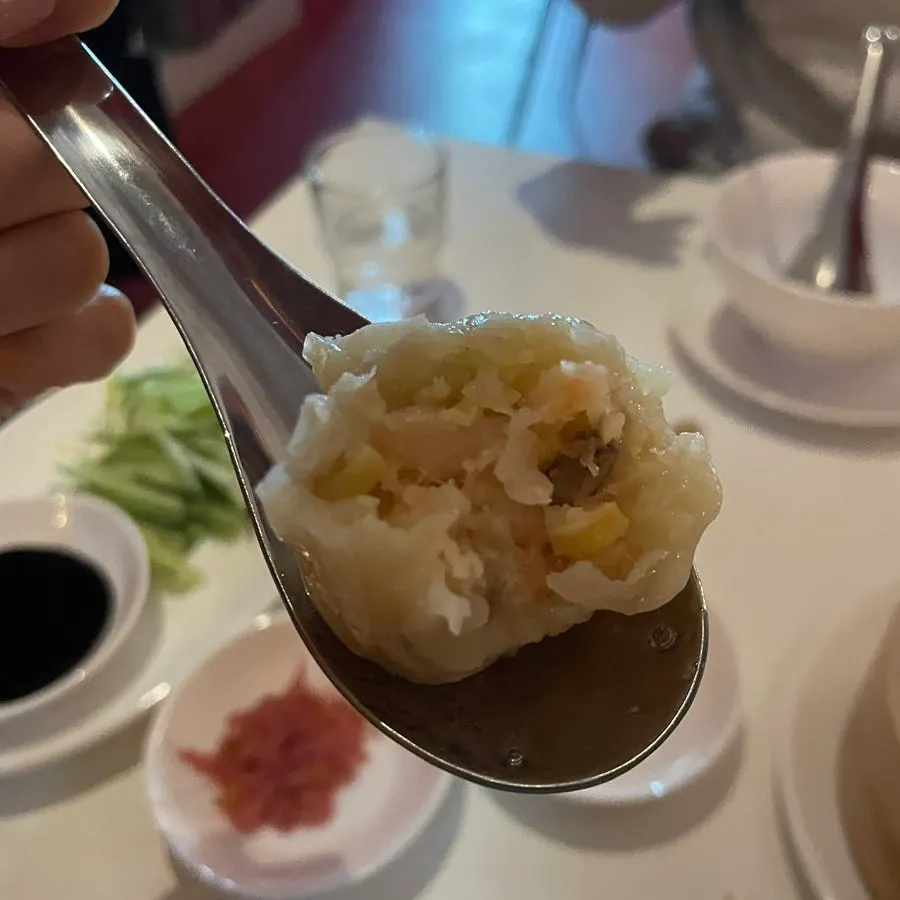 Cross-section of siu mai showing shrimp meat
