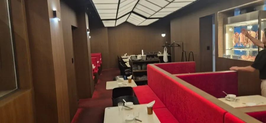 Seating mostly set up for two- or four-person tables