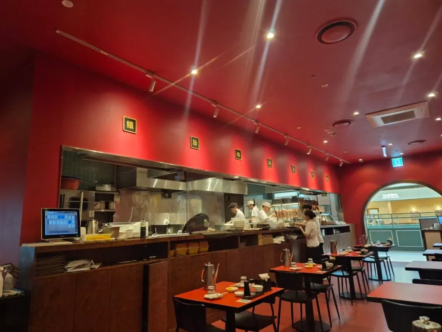 Open kitchen cooking area at the entrance of Mirim Yangjang