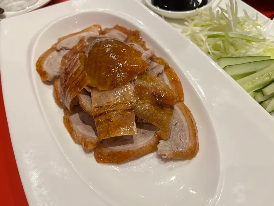 Half-eaten plate of Peking duck