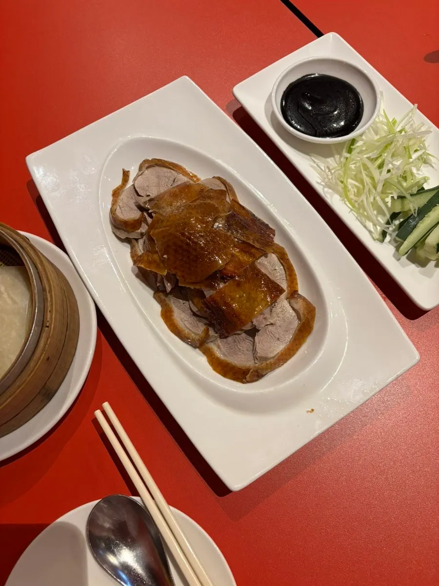 Half a Peking duck served on a plate