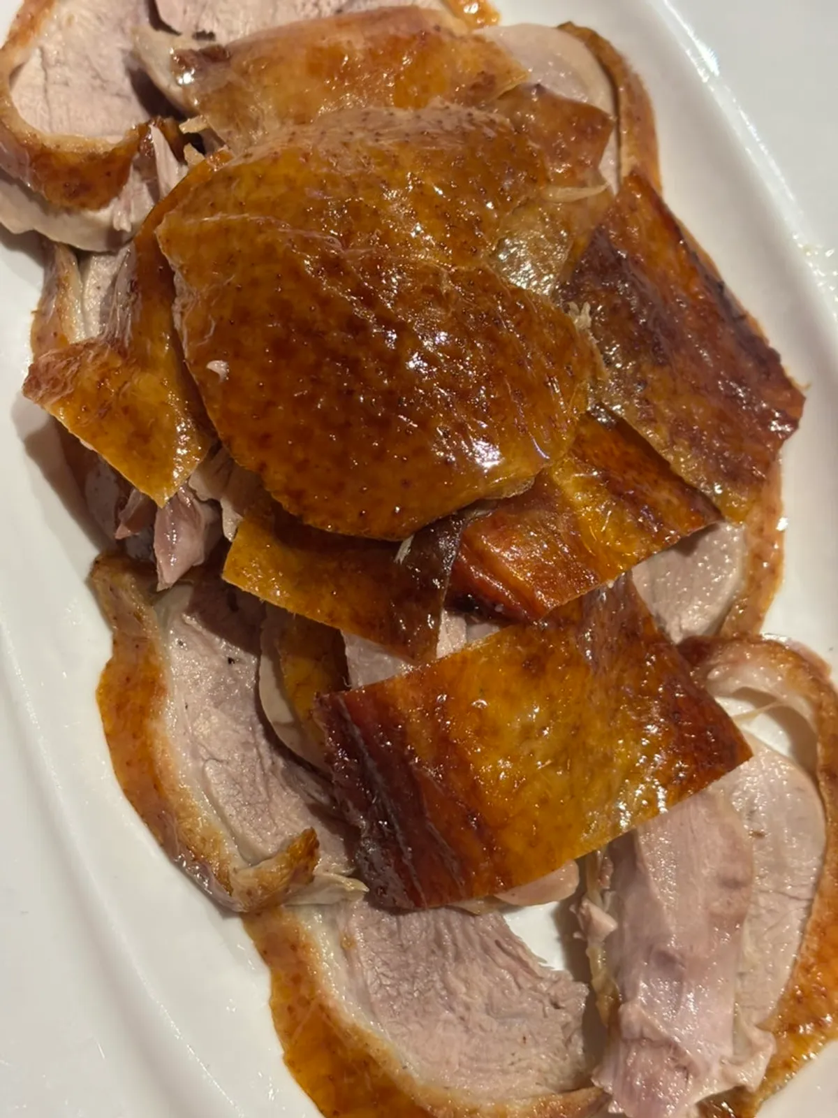 Close-up of glossy half Peking duck