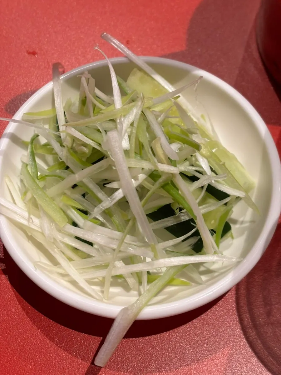 Pancake wrapped with duck meat and scallion