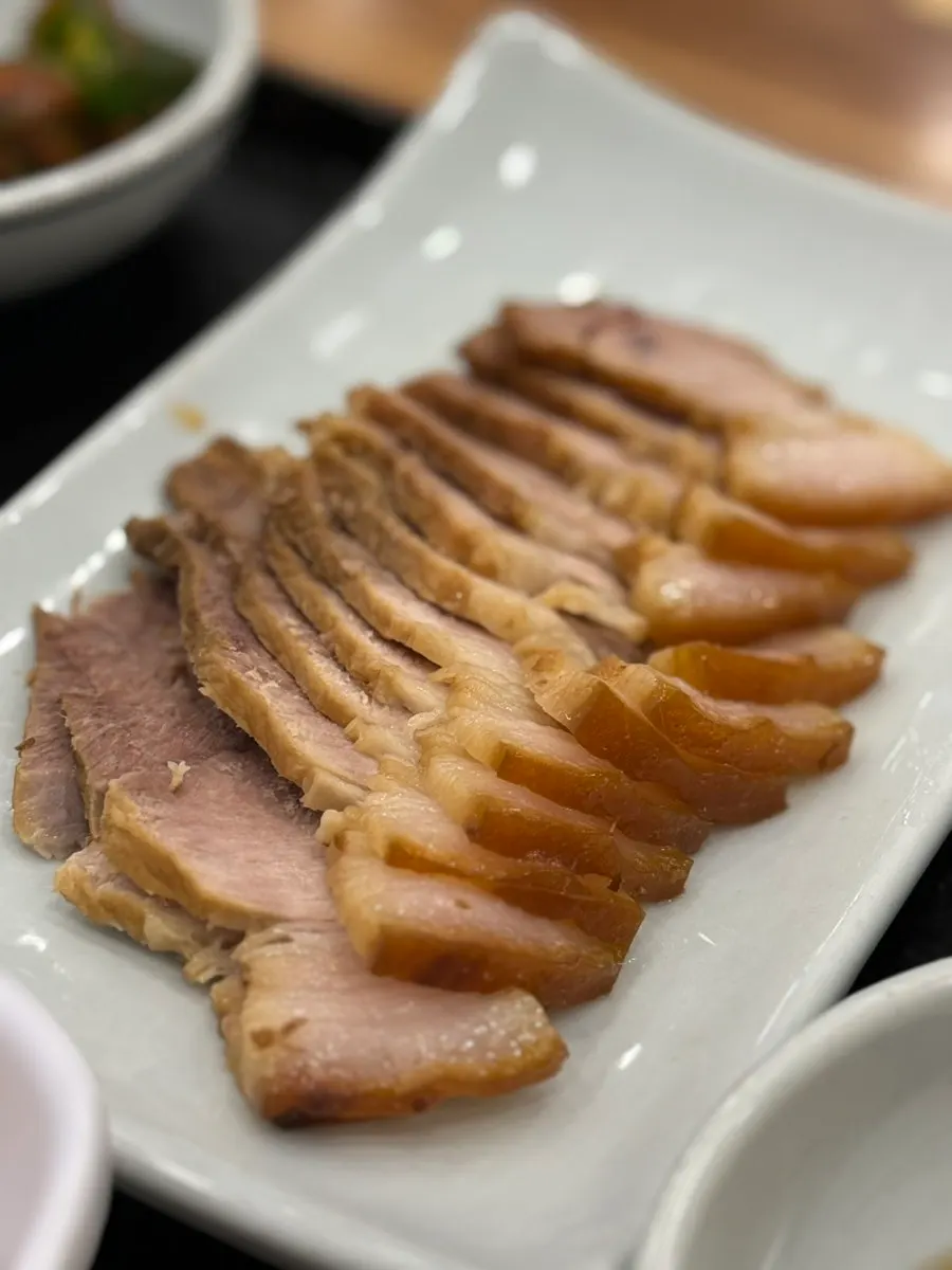 Warm boiled pork, mackerel, and Sanghwang loach soup set spread