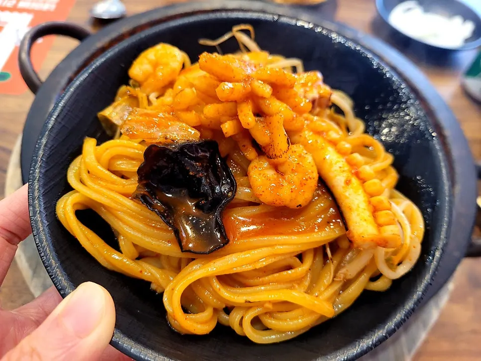 Seafood-filled broth in the dolpan jjamppong